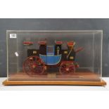 A cased kit built highly detailed model of an English stage coach. Case measures approx 60 x 32 x