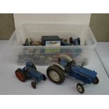 A collection of loose vintage diecast tractors and Land Rovers to include Dinky, Corgi and Matchbox.