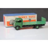 Boxed Dinky 513 Guy Flat Truck in two tone green, showing some paint chips mainly to flat bed, gd