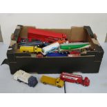 Box of approx 30 loose playworn diecast model lorries and tankers, mid 20th century onwards,