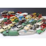 Around 45 mid 20th C play worn Dinky diecast models to include road and commercial examples