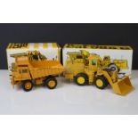 Two boxed continental CAT construction diecast models to include NZG Radlader CAT 988B (diecast