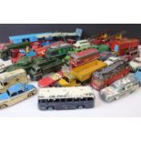 Around 32 mid 20th C play worn diecast models to include Corgi and Dinky featuring Corgi