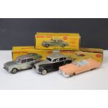 Three boxed Dinky diecast models to include 131 Cadillac Tourer in pink with driver, 165 Humber Hawk