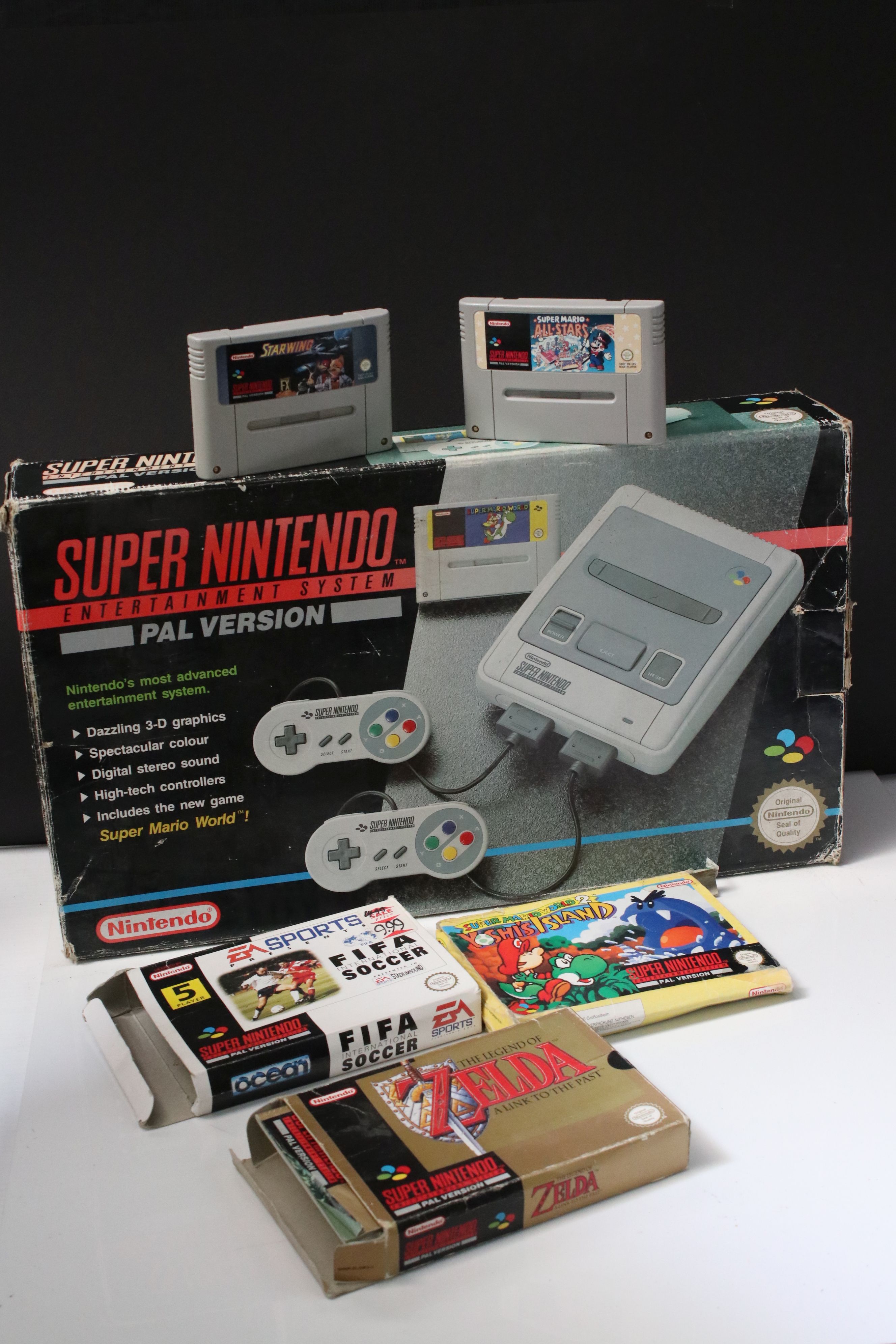 Retro Gaming - Boxed Super Nintendo SNES console with one controller and Super Mario World cartridge