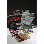 Retro Gaming - Boxed Super Nintendo SNES console with one controller and Super Mario World cartridge