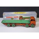 Boxed Dinky Supertoys 902 Foden Flat Truck in orange and green, showing play wear and paint loss,