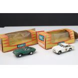 Two boxed Minic slot cars to include M1559 Jaguar in green and Aston Martin in white, dusty boxes,