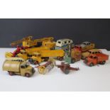 14 mid 20th C play worn Dinky diecast models, mainly commercial and construction examples