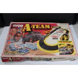 Boxed Tyco A Team Action Racing set with both slot cars, unchecked but appears complete with