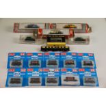 16 Boxed / carded N gauge items of rolling stock to include 10 x Peco, 3 x Lima, 2 x Fleischmann & 1