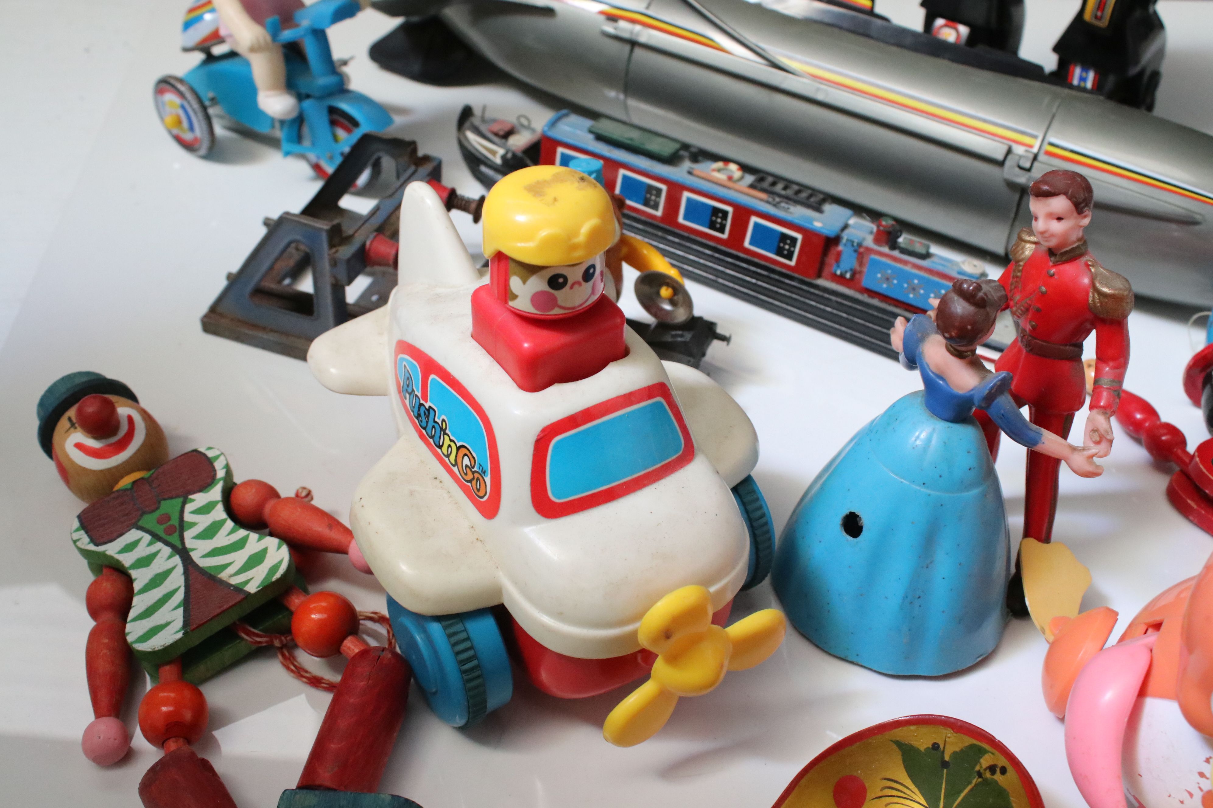 Group of mixed toys to include wooden puppets, plastic robot, plastic submarine etc - Image 2 of 6