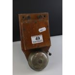 A vintage wooden cased bell.