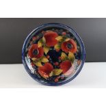 Moorcroft Pomegranate pattern Plate, painted blue mark to base ' Moorcroft, potter to H M the