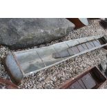 A vintage galvanised free standing water / food trough, measures approx 244cm