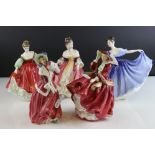 Five Royal Doulton Figurines including Top o' the Hill, Fair Lady (red), Christmas Morn, Southern