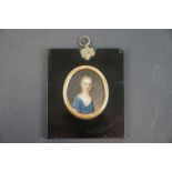 Early 19th century oil painting miniature young girl in dress.