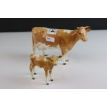 Beswick Guernsey Cow, first version, model 1248a together with a Beswick Guernsey Calf, model 1249a