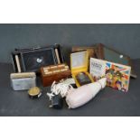 A box of mixed collectables to include a leather framed mirror, a vintage volt meter and a vintage