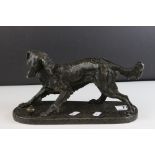 Spelter Model of a Collie Dog playing with a Spinning Top, 27cms long