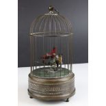 A Singing Bird Automaton, Mid century, with two bird's sat within foliage, contained in a bronzed