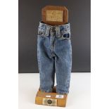Pair of Shop Display Advertising Leon Co. Miniature Pair of Jeans mounted on a Wooden Stand, 49cms