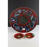 Poole Pottery Charger, 36cms diameter together with Two Poole Delphis Pattern Trinket Dishes