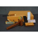 A cased set of AM-Tech miniature wood working tools to include wood plane and set squares.
