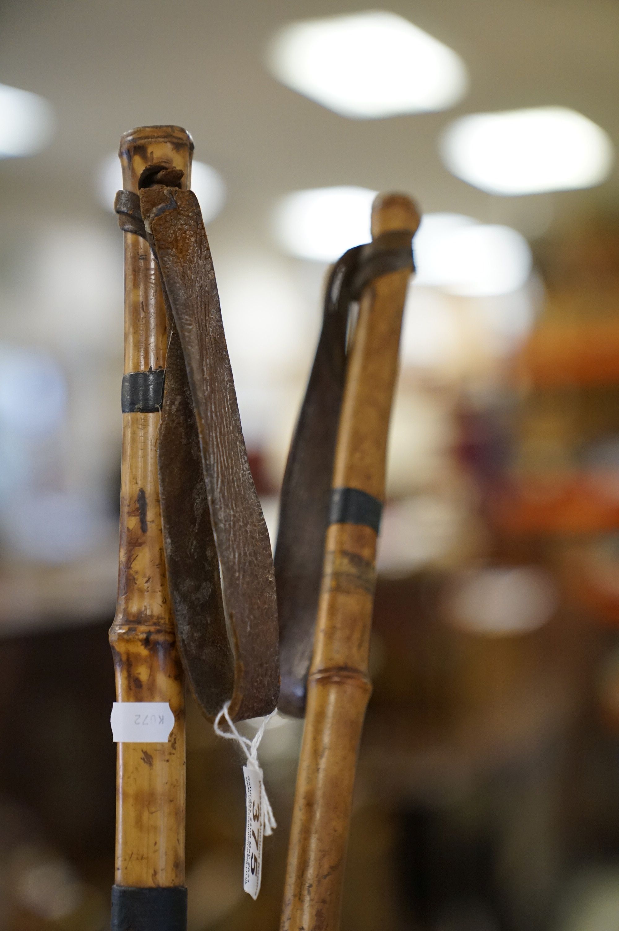 A pair of vintage cane Ski poles together with a wooden handled pick. - Image 2 of 9