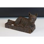 Solid bronze recumbent fox on wall effect plinth