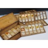 A cased set of antique medical glass slides, slides marked Glasgow Royal Infirmary pathological dept