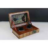 Early 20th century Double Inkwell Stand in the form of two leather bound antique books, 21cms wide