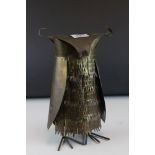 A stylised metal ornamental owl.
