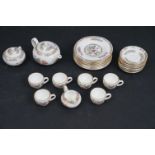 A Wedgwood miniature tea set to include teapot, sugar bowl, milk jug, 6 x cups, 6 x saucers and 6