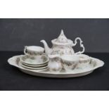 A Royal Doulton Brambly Hedge miniature tea service to include tray, tea pot, 2 x cups, 2 x