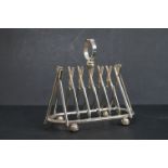 Silver plated toast rack in the form of cricket bats