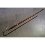 Walking Stick with a Brass Handle in the form of a Horse Head together with another Walking Stick