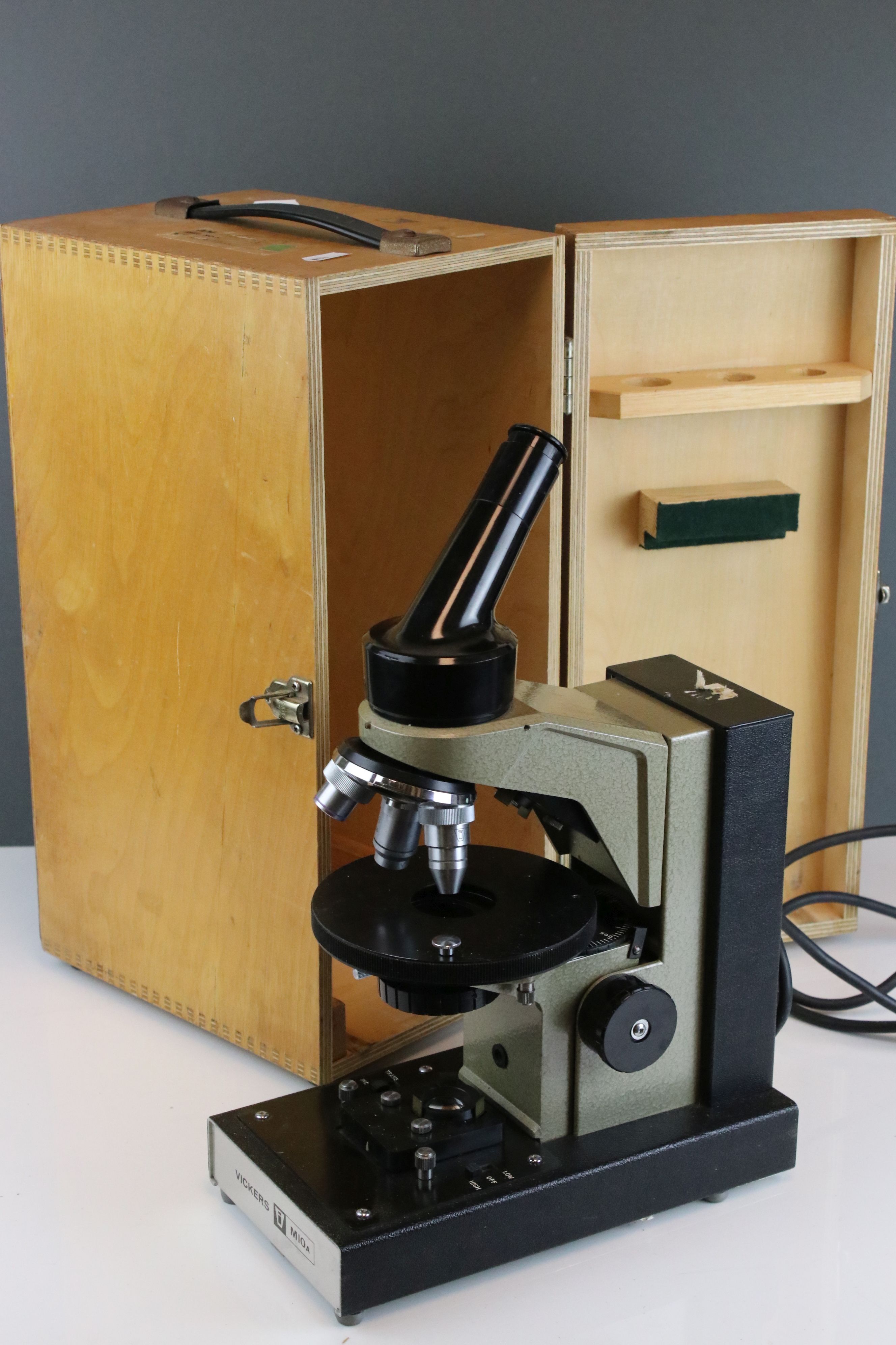 Mid 20th century Vickers electronic microscope complete with wooden storage case.
