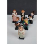 A collection of three Royal Doulton Dickens figures to include Little Nell, Tiny Tim, David