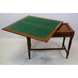 Late 19th / Early 20th century Oak Fold-over Card Table with single drawer, raised on turned