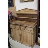 Victorian Pine Chiffonier, the arched back with two shelves, above two drawers and two cupboard