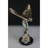 A figure of the Spirit of Ecstasy with white metal finish mounted to a marble base, 28cms high