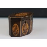 A Georgian mahogany tea caddy with decorative floral panels, approx 11cm in height.