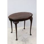 Early 20th century Oval Mahogany Side Table raised on cabriole legs, 85cms long x 75cms high