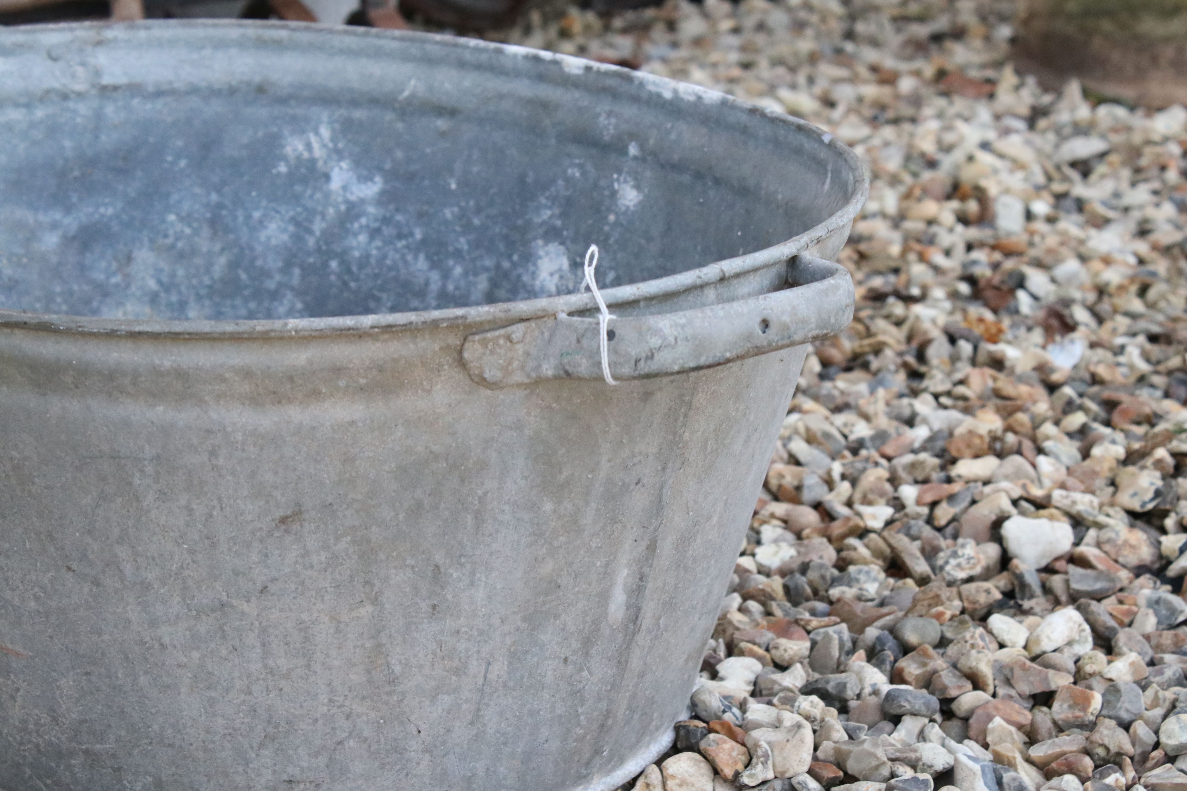 A vintage galvanised steel twin handled bucket. - Image 2 of 2