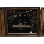 19th century Silk Needlework of H.M.S Blenheim bordered by floral sprays, 51cms x 41cms, framed