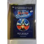 A framed and glazed poster from the 20th anniversary performance of Blood Brothers, signed by