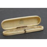 A Georgian ivory hinged toothpick holder with gold inlay decoration to the lid.