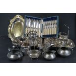 A box of metal ware to include silver plate and pewter ware.