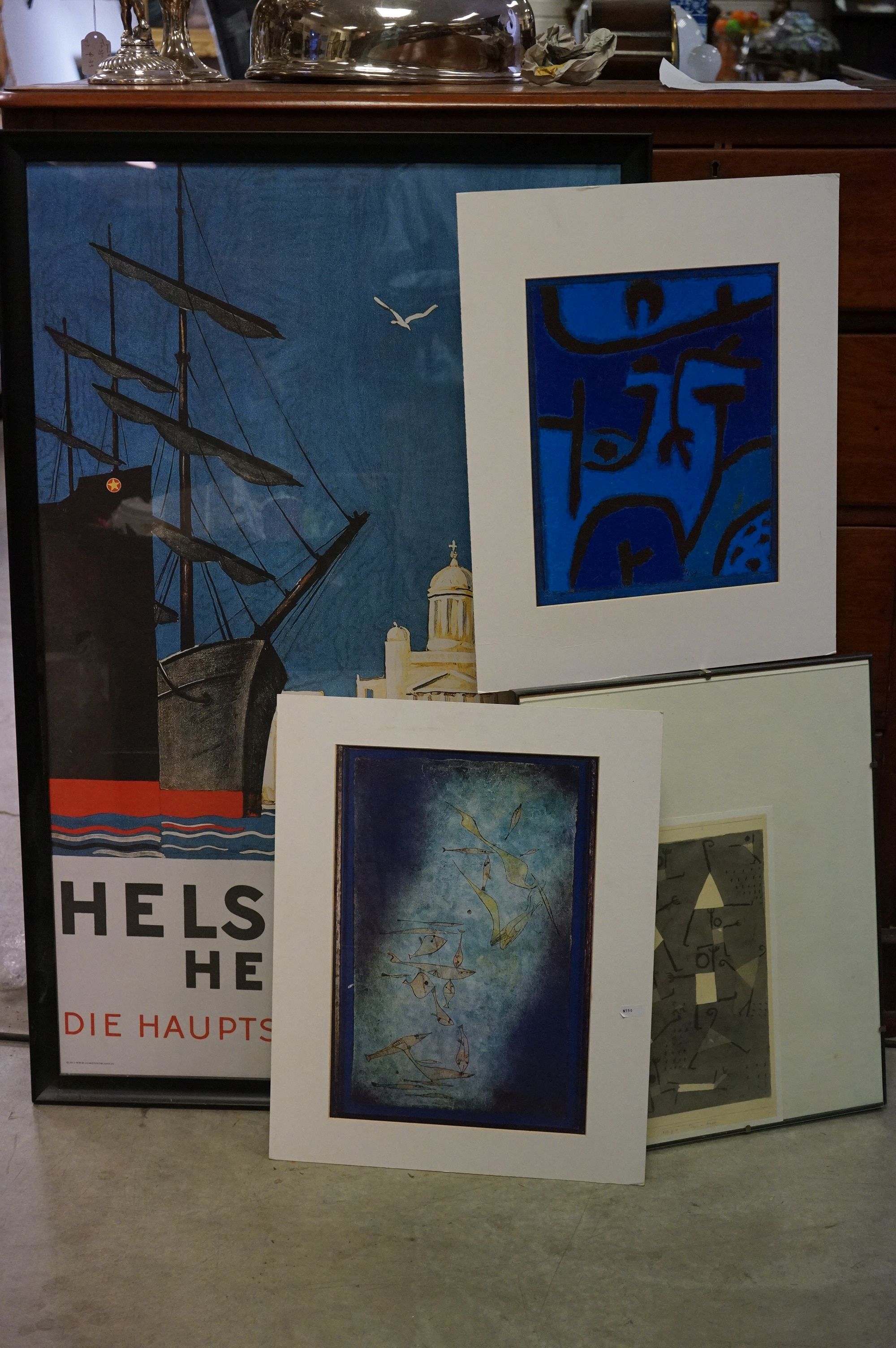 A framed and glazed Helsinki Helsingfors poster, together with three modernist prints.